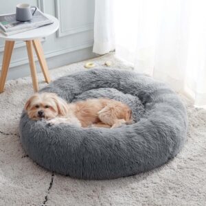 Ultra-Soft Plush Medium Calming Dog Bed for Medium Small Dogs and Cats, Self-Warming and Washable. Round dog bed offers a safe to our loyal friend Kitties and puppies. Your little furry friends will feel surrounded by mom's love and warmth since the faux fur surface, allowing them to experience truly restful sleep. Additionally, they could calm down faster, relax more easily and have a sweet dreams on this self-warming luxury dog bed.